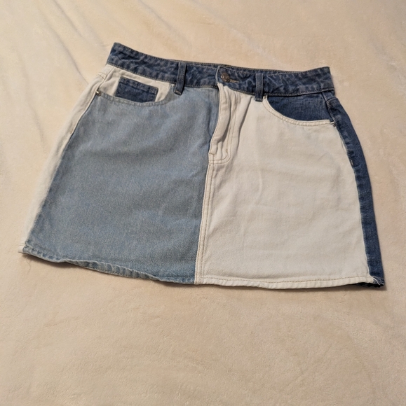 refuge Dresses & Skirts - - Refuge Denim Mini Skirt. Different colours of denim. size a medium .
